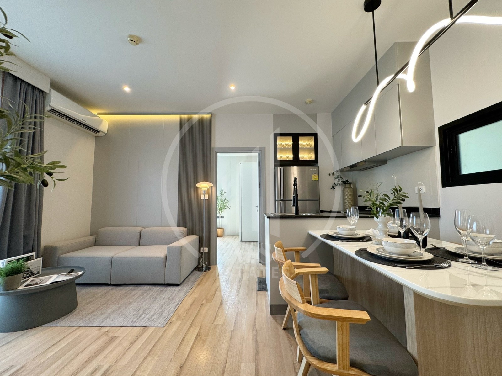 The Base UP Town Condominium