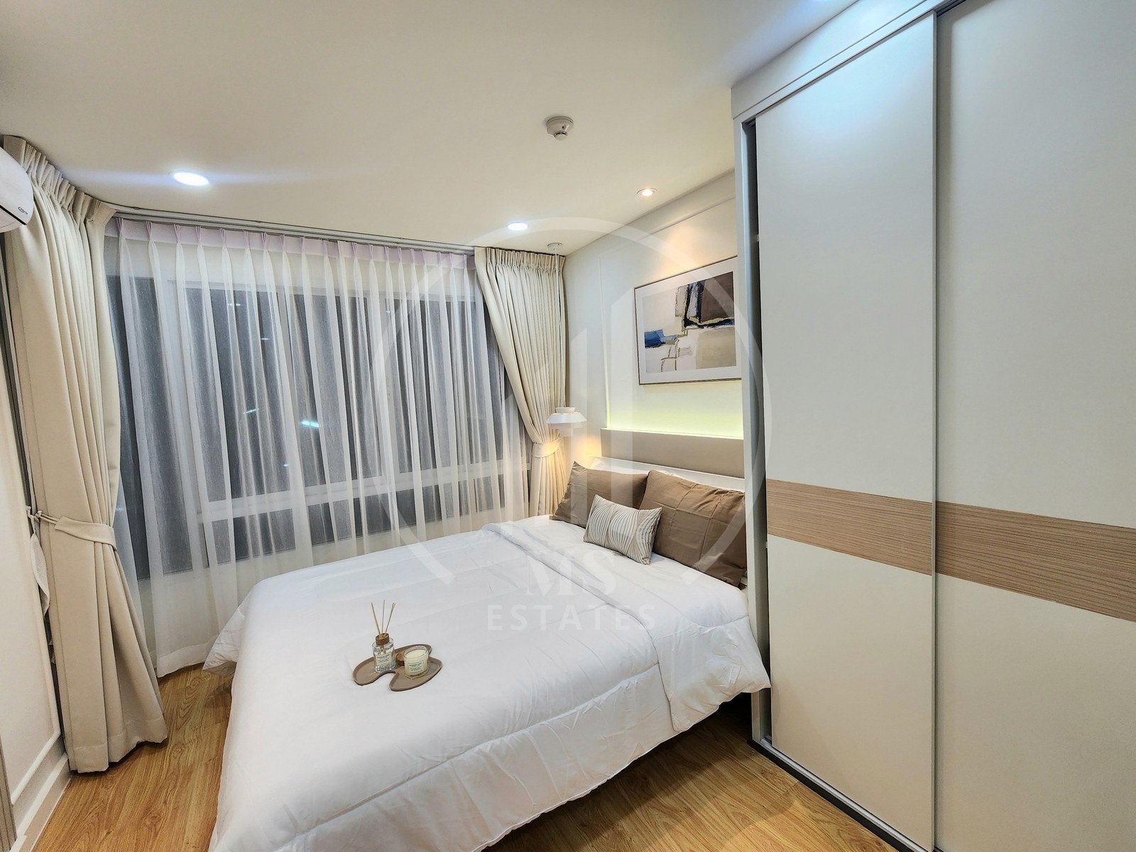 Plus 1 Condominium – photo 4